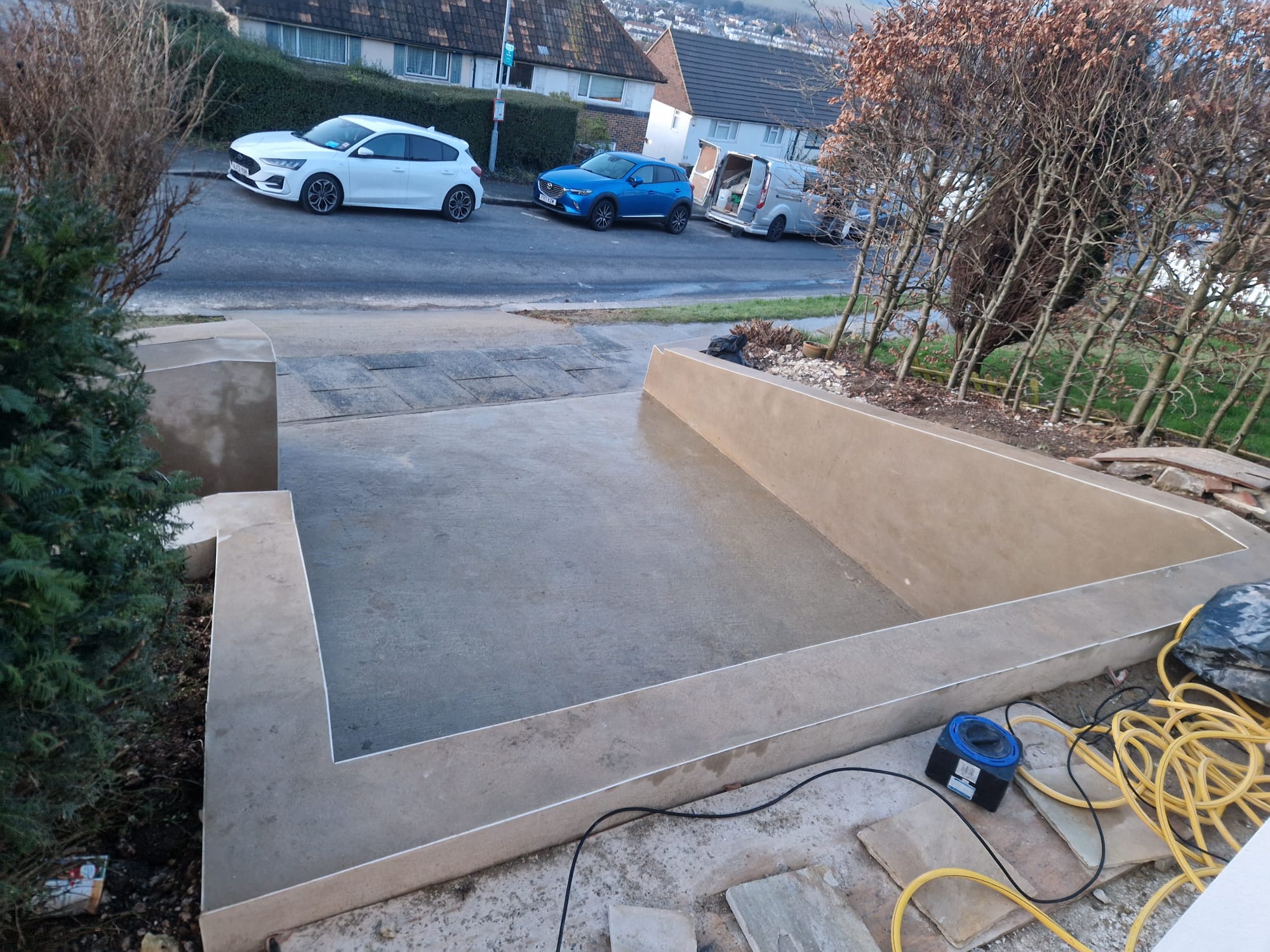 Concrete parking platform on a slope