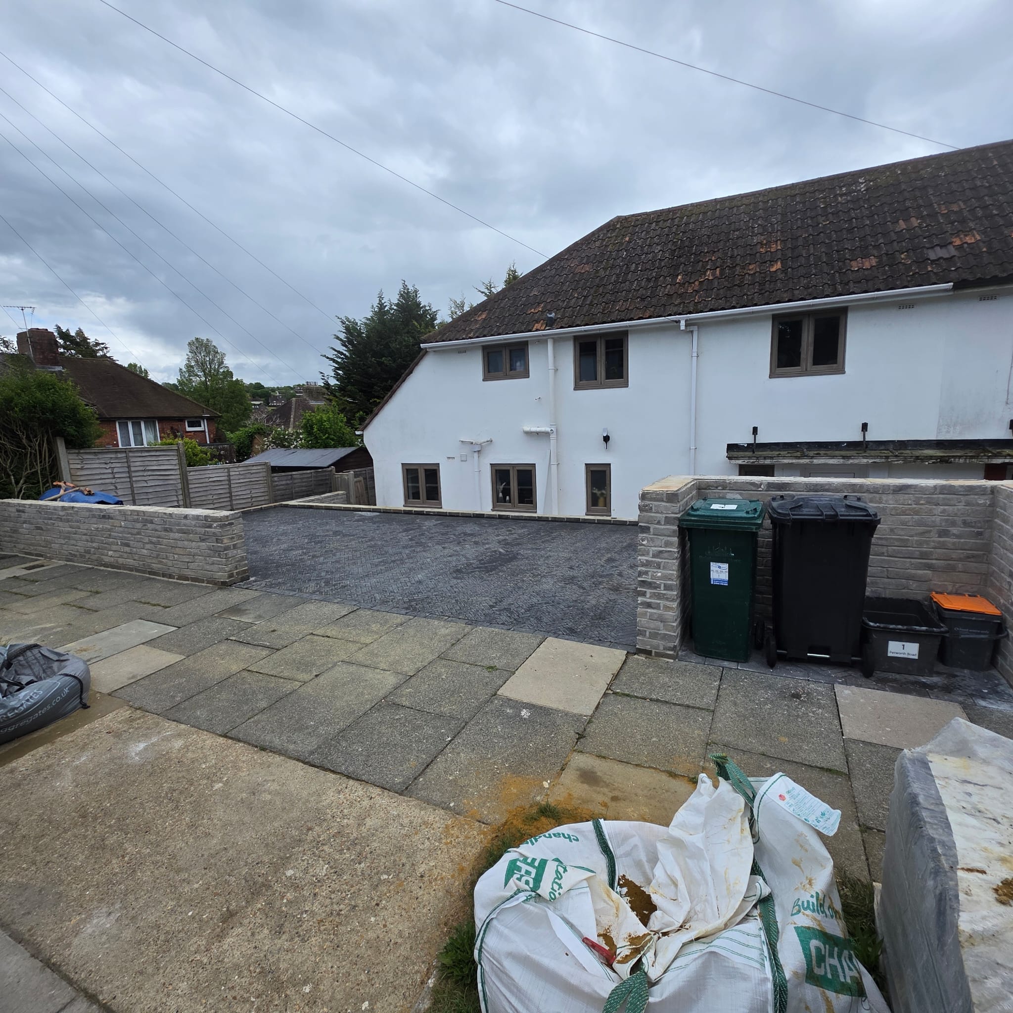 Block-paved rear yard with patio slabs